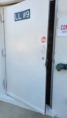 Metal Door,entry commercial metal door,door,damaged door,door,door bend,door bent,fire door,entrance door,enrtry door,